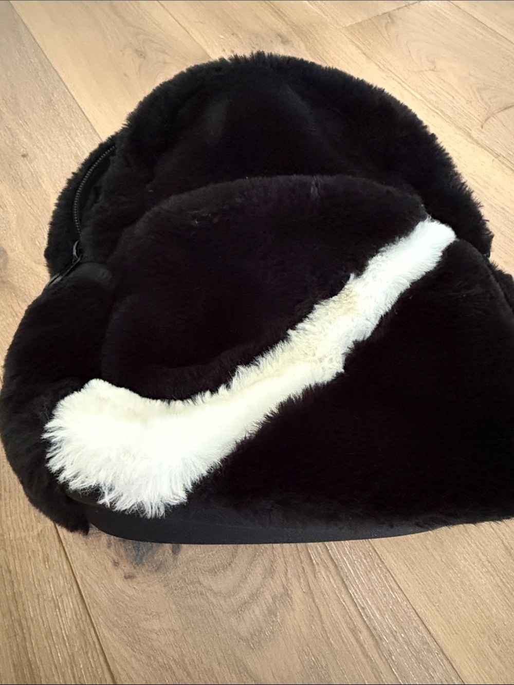 Cozy Black Faux Fur Backpack with White Swoosh - Picture 2 of 9